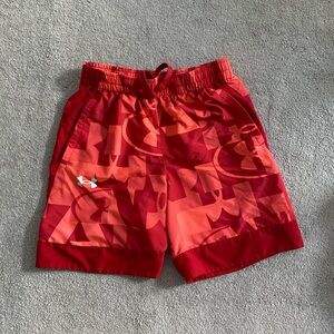 Under Armour boys shorts.  Size youth medium, color is red.